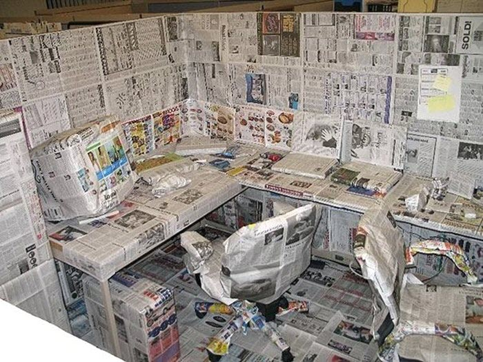Funny-office-prank-idea-cubicle-newspapers