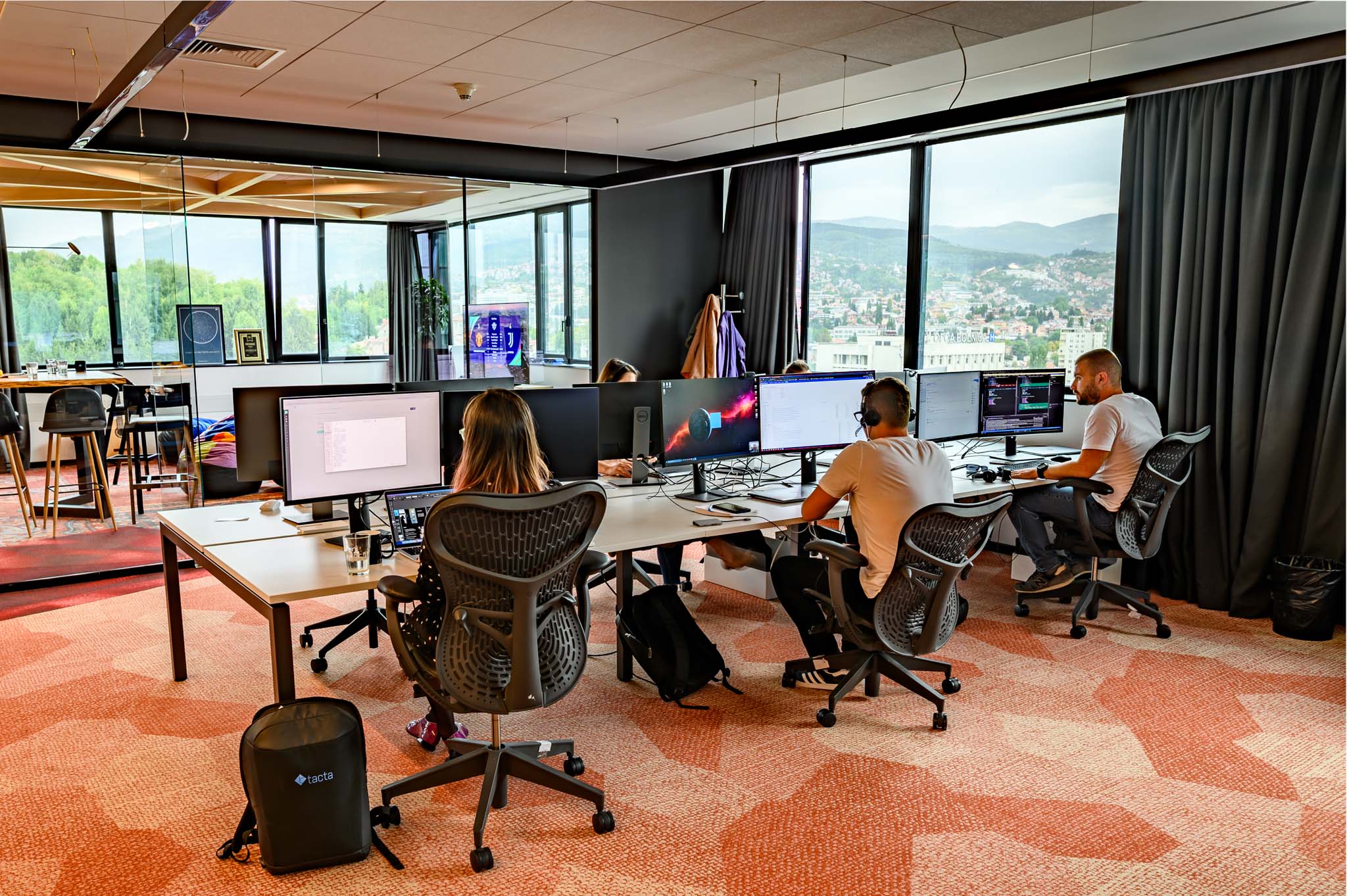 Tacta offices and Tacta employees working