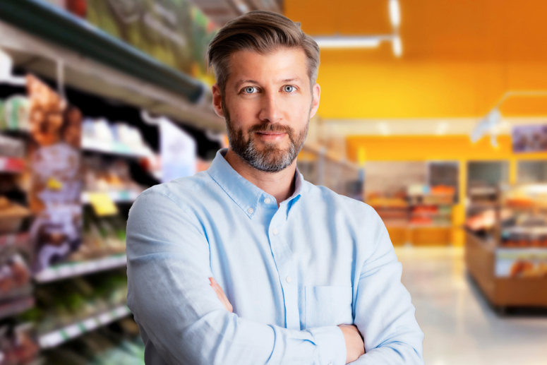 A person with his arms crossed in a grocery store

AI-generated content may be incorrect.