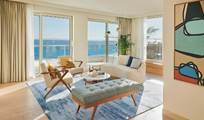 A living room with a view of the ocean

AI-generated content may be incorrect.